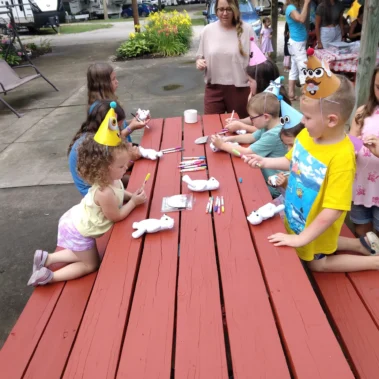 young children at picnic table