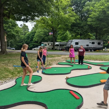 kids playing mini golf